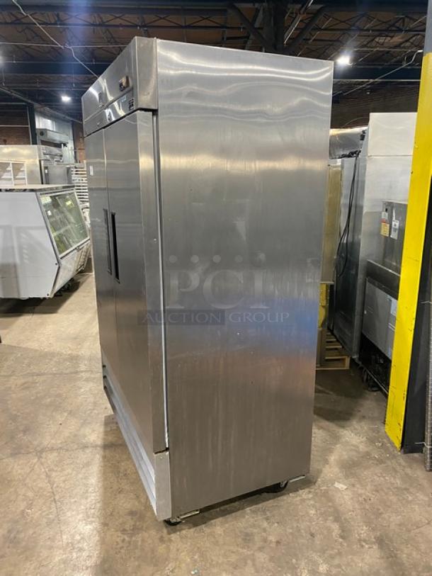 Kelvinator commercial stainless steel 2-door reach-in refrigerator, Model KCBM48R, with poly coated wire racks, on casters.