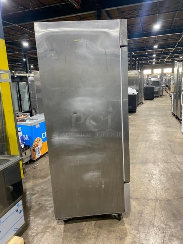 Kelvinator commercial stainless steel 2-door refrigerator, model KCBM48R, on casters. Includes poly-coated wire racks.