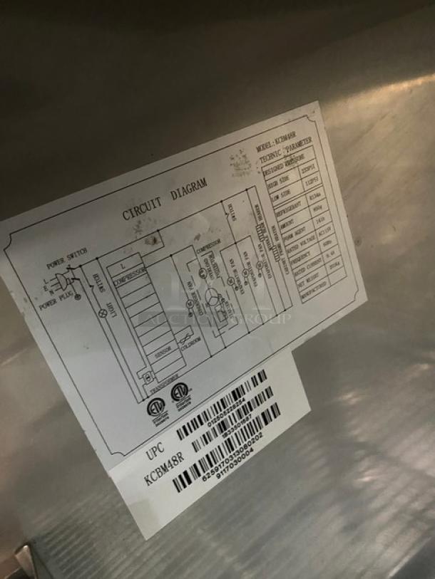 Kelvinator KCBM48R stainless steel 2-door reach-in refrigerator, poly-coated wire racks, 115V, on casters, circuit diagram visible.