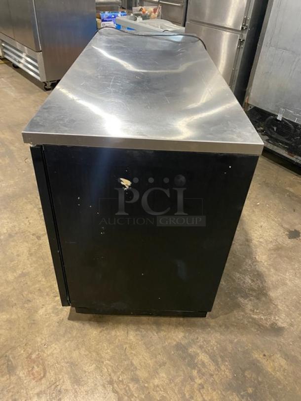Asber ABBC68 black 2-door back bar cooler with stainless steel worktop and poly-coated wire rack. Model: ABBC 68 SN: 19032043.