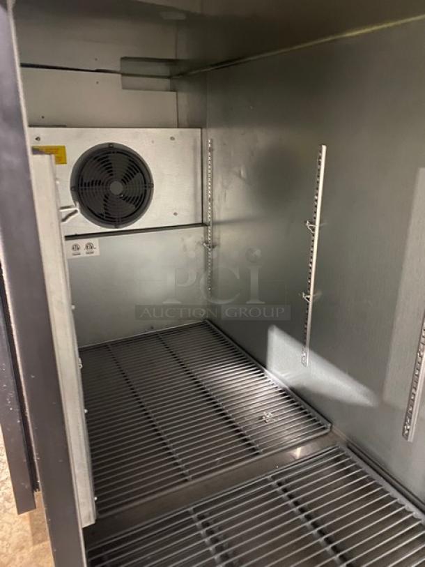 Asber ABBC68 black 2-door bar cooler, stainless steel top, poly coated wire rack, 115V 1 Phase, SN: 19032043, excellent condition.