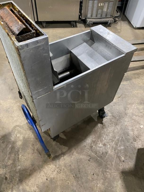 Pitco VF35 stainless steel natural gas fryer, 35 lb capacity, with back splash, basket hanger, blue gas hose, on casters.
