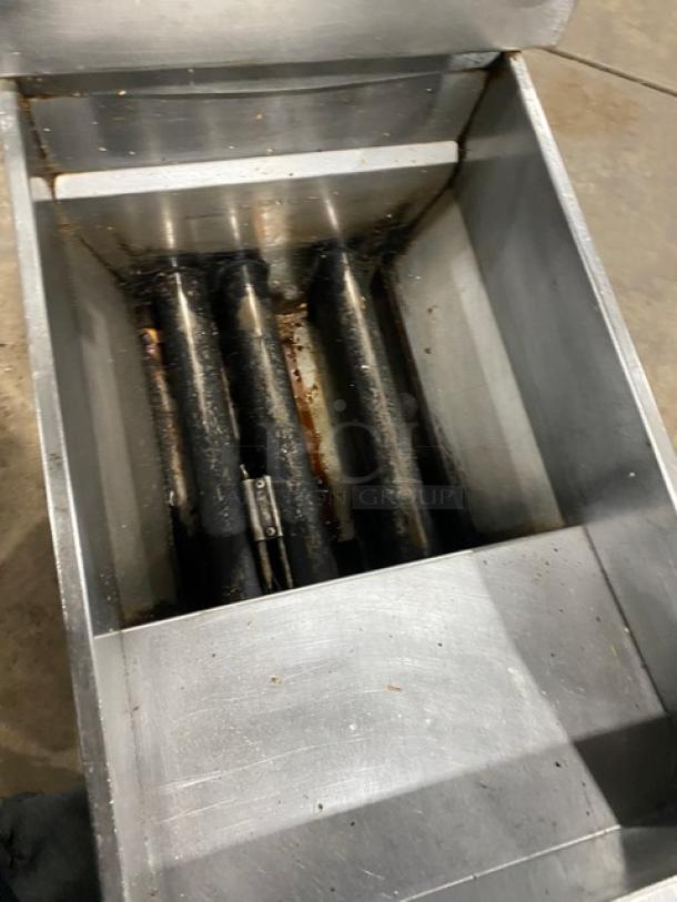 Pitco VF35 stainless steel 35 lb. deep fat fryer, natural gas, with backsplash, basket hanger, and blue gas connector hose.