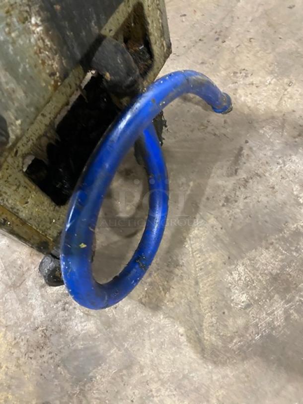 Pitco VF35 deep fat fryer with blue gas connector hose and casters, showing wear.