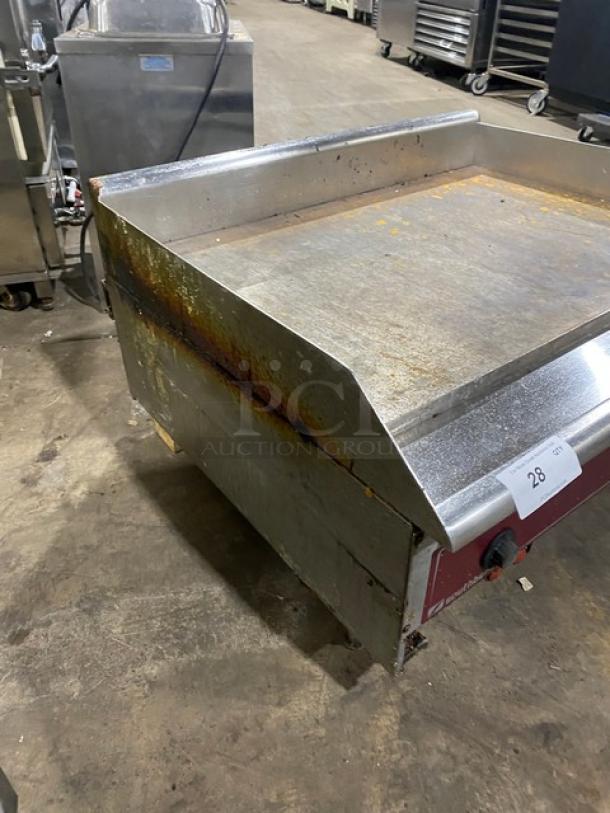Southbend commercial stainless steel natural gas countertop flat griddle with back and side splash, on legs. Used condition.