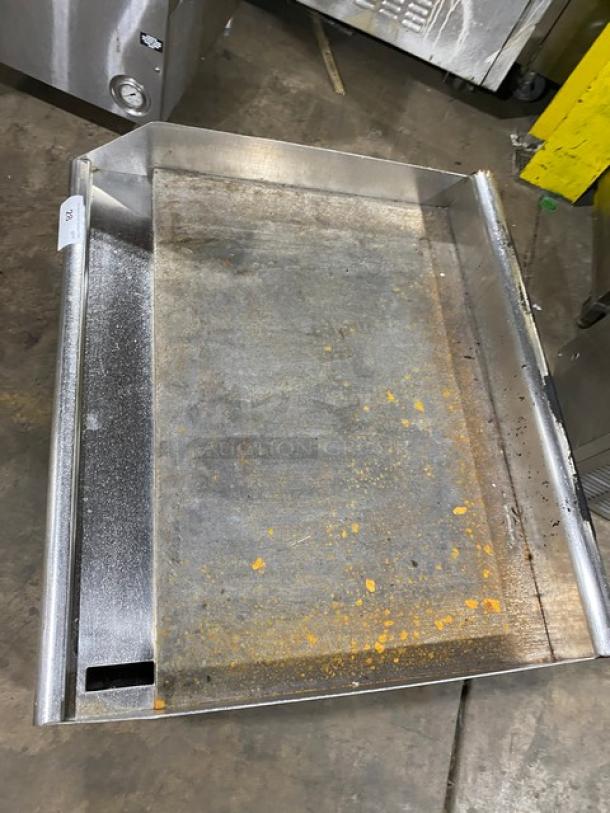 Southbend commercial stainless steel natural gas flat griddle with back and side splash, on legs. Features visible wear.