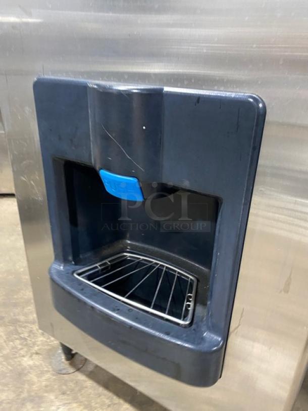 Hoshizaki DKM-500BAH stainless steel ice maker/dispenser, air-cooled, Energy Star certified, model label visible, on legs.