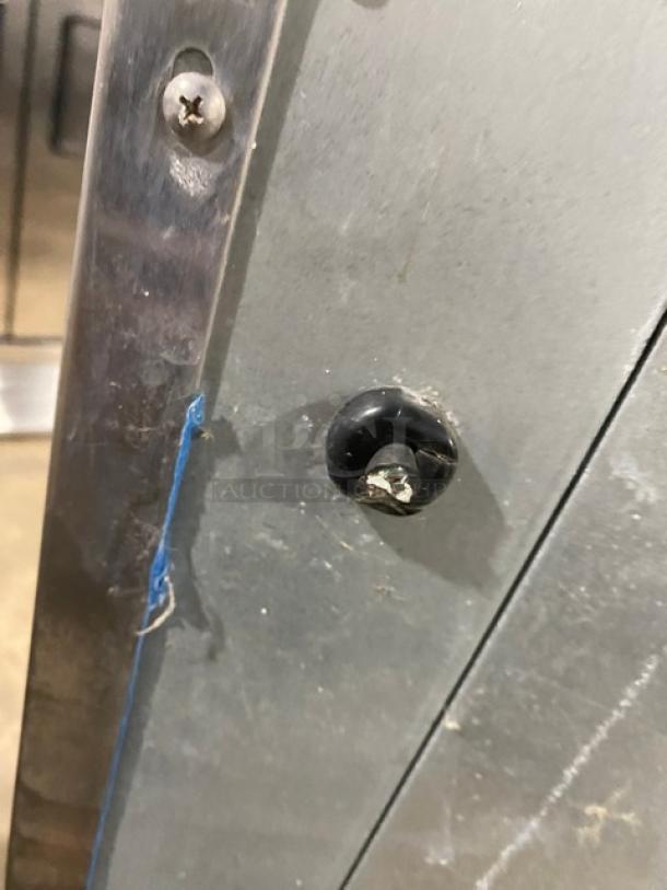 Hoshizaki DKM-500BAH stainless steel ice maker. Energy Star certified, electric, air-cooled, on legs. Visible hardware detail.