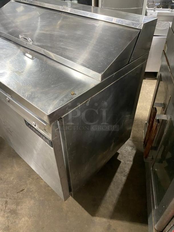 Continental Commercial Stainless Steel 2-Door Refrigerated Bain Marie Prep Table with legs, 115V, in used condition.