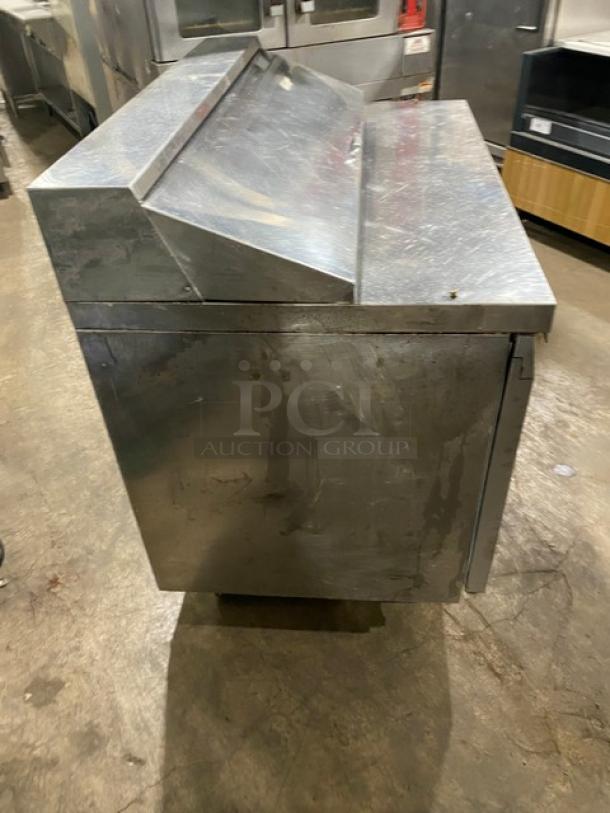 Continental stainless steel 2-door refrigerated salad/sandwich prep table, Bain Marie style, 115V, on legs, used condition.
