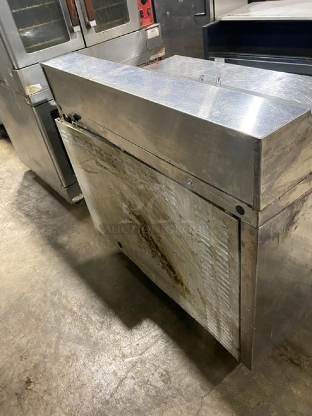 Continental stainless steel 2-door refrigerated prep table, bain marie style, 115V, on legs, visible wear and discoloration.