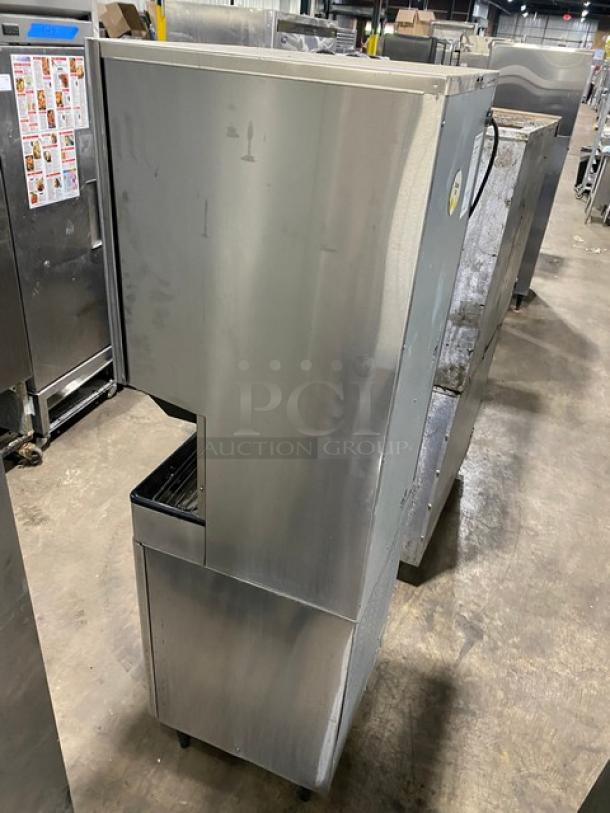 Hoshizaki DT-400BAH-OS stainless steel ice and water dispenser, air-cooled, electric, 115-120V, on legs, used condition.