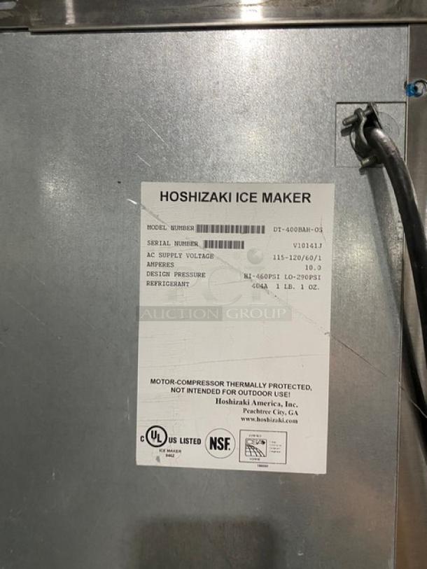 Hoshizaki stainless steel ice maker, model DT-400BAH-OS, with water dispenser. Serial V10141J. 115-120V 1 phase.