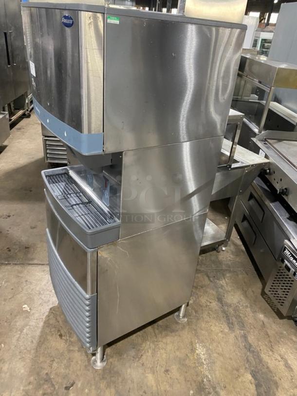 Follett Symphony Plus 110FB425W stainless steel ice and water dispenser, electric, water-cooled, on legs, 115V, 1 phase, good condition.