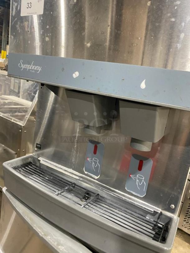 Follett Symphony Plus ice and water dispenser, Model 110FB425W, stainless steel, water-cooled, on legs, dual spouts, 115V.