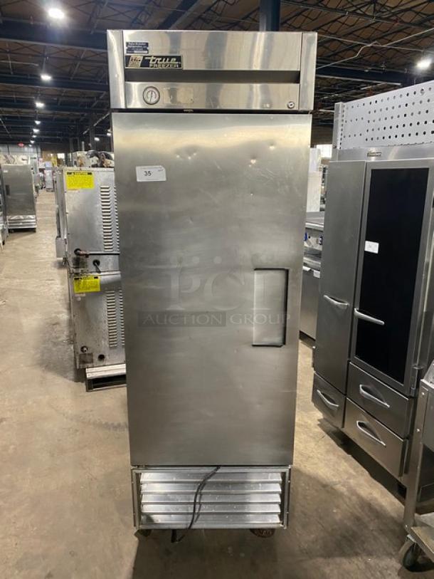 True T-23F commercial stainless steel single door reach-in freezer with built-in pan slides, on casters, Model: T-23F.