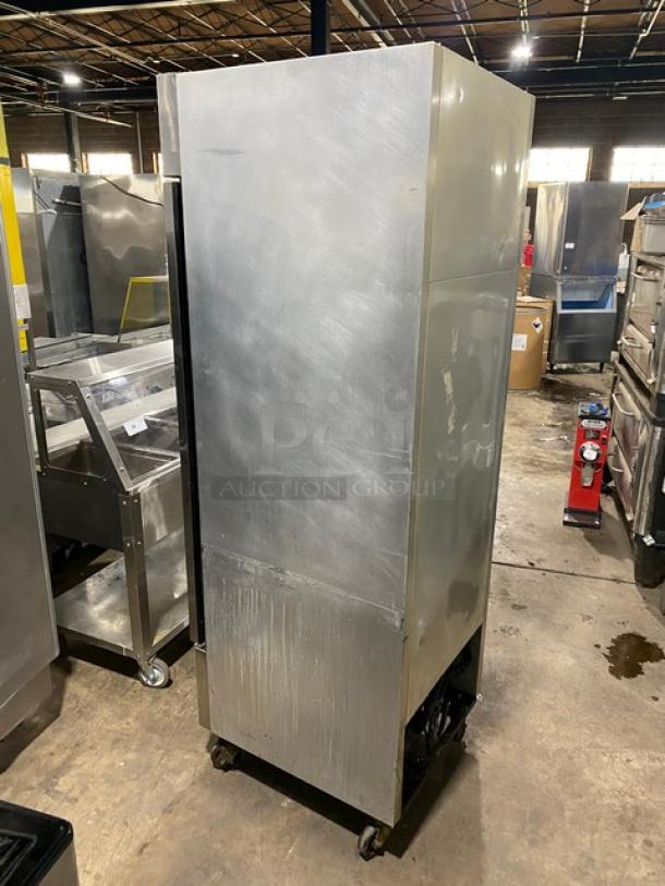 True T-23F stainless steel single door reach-in freezer, built-in pan slides, 115V, 1-phase, on casters, model SN: 1-4121330.