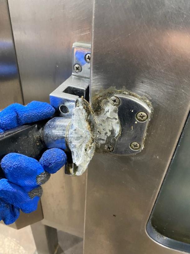 Alto-Shaam Combitherm combi oven handle detail, model 714MLG, stainless steel, visible wear, natural gas, single undershelf.