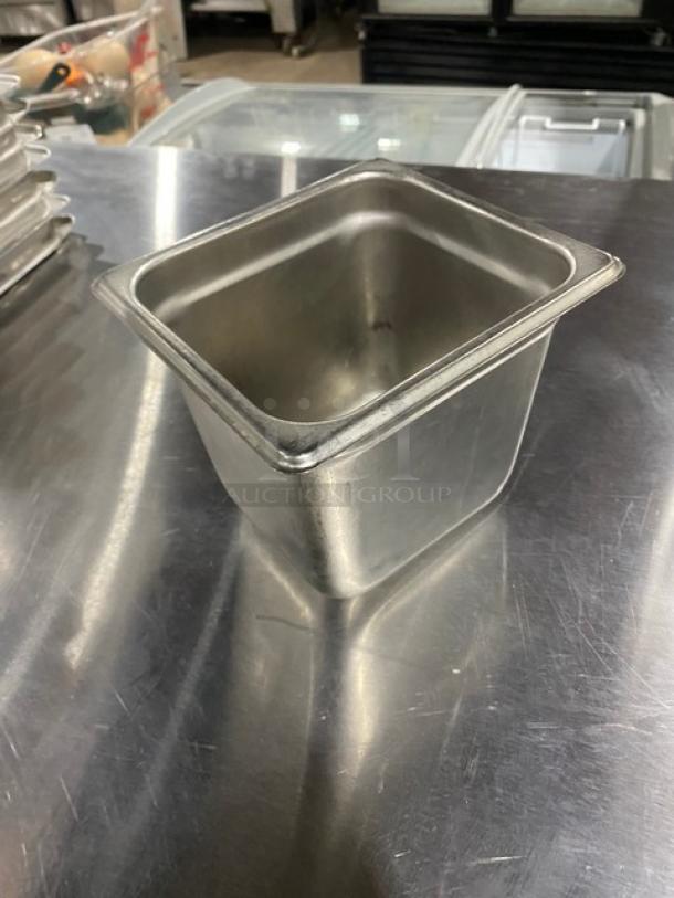 Commercial stainless steel steamtable pan, used condition, rectangular shape with reinforced edges, suitable for hotel use.