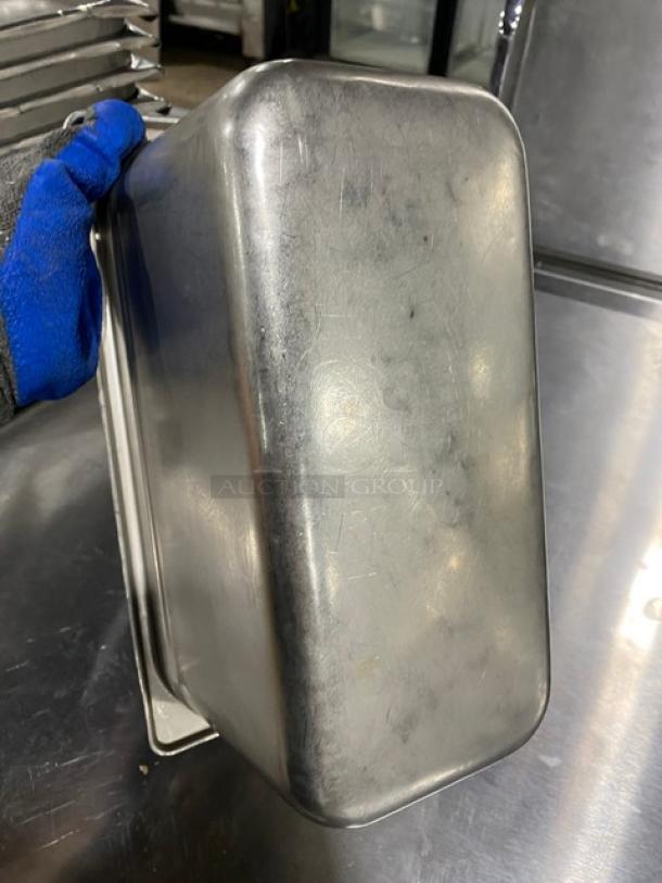 Commercial stainless steel steamtable pan with a polished finish. Used condition, stackable design, 10-inch dimensions.
