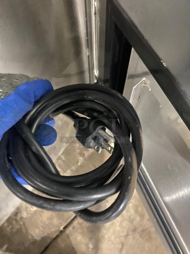 Coiled power cord for Leader NRHD96R refrigerated display case. Black, three-pronged, in good condition.