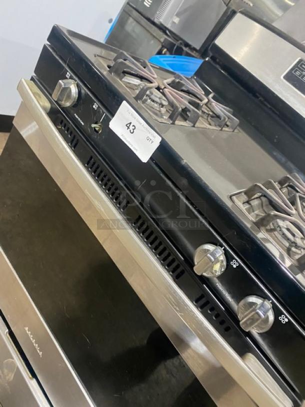 Amana commercial 4-burner range/oven combo in stainless steel/black, digital push button controls, wired oven rack.