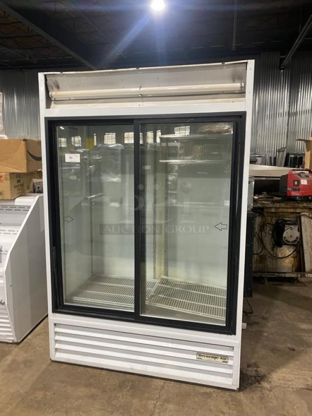 Beverage-Air MT45 commercial refrigerator with white double glass sliding doors. Includes poly-coated wire rack. 115V, 1 Phase.