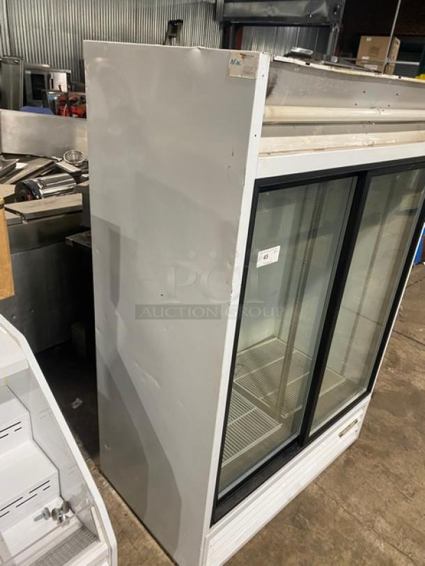 Beverage-Air MT45 commercial fridge, white, double glass sliding doors, poly-coated wire rack, model MT45, serial 5263195.