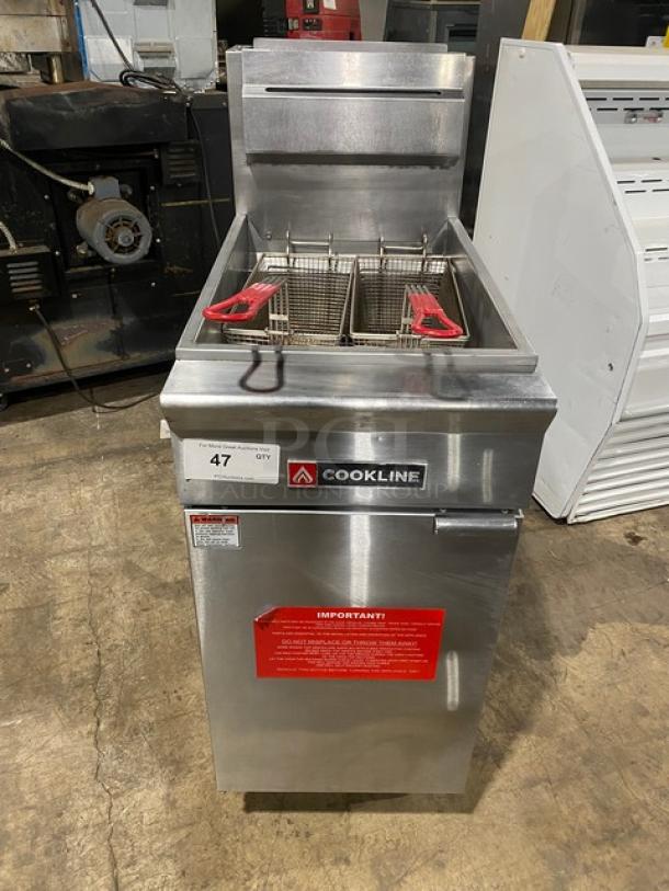 Cookline commercial stainless steel deep fat fryer with back splash, basket hanger, fry baskets, and legs. Natural gas powered.