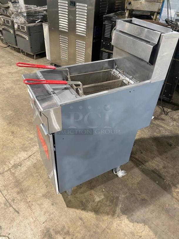 Cookline commercial stainless steel deep fat fryer with backsplash, basket hanger, fry baskets, and legs; natural gas powered.