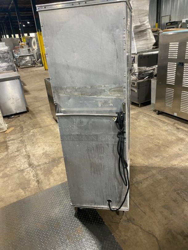 Precision electric full-height heated holding/proofing cabinet with built-in pan slides, on casters, fair condition.