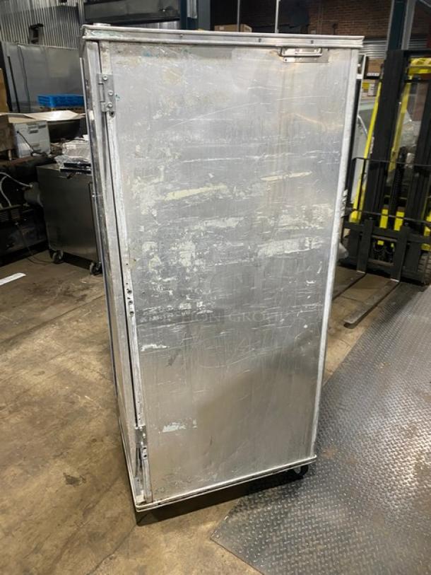 Precision commercial heated holding/proofing cabinet with built-in pan slides, full-height, on casters, used condition.