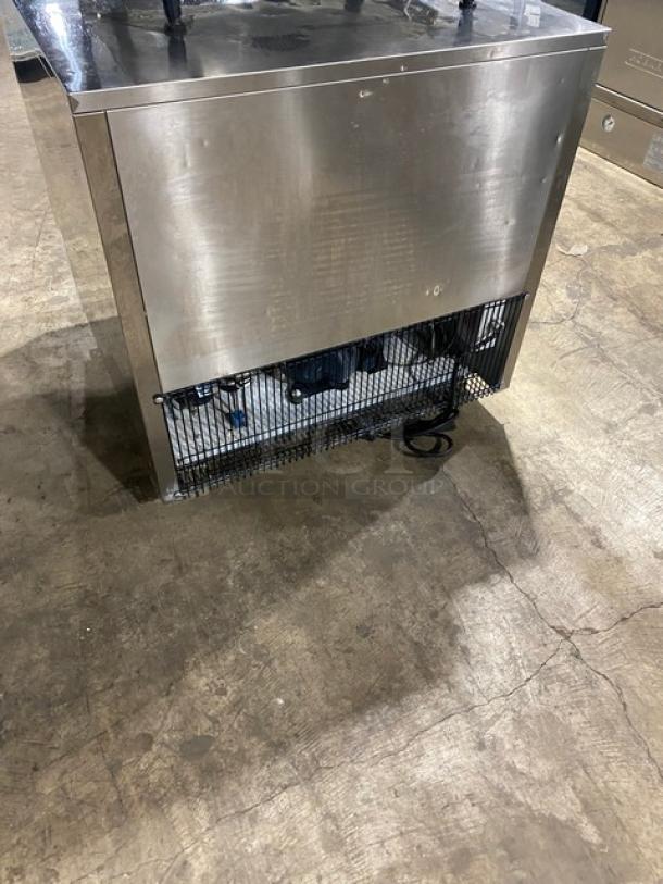 Irinox Icy Series stainless steel undercounter blast chiller, model ICY S, on casters, with chrome-plated wire racks.