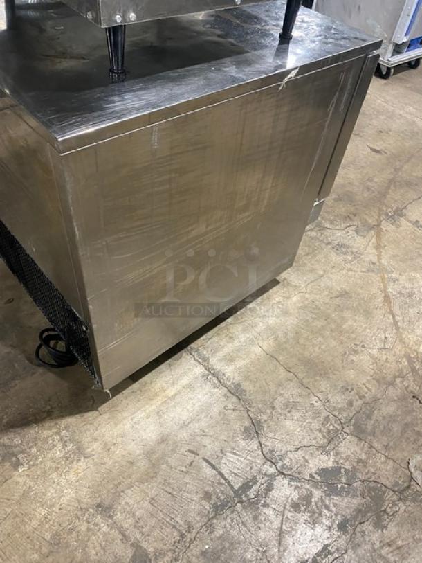 Irinox ICYS stainless steel undercounter blast chiller with single door, chrome wire racks, on casters, 208V 2-phase.