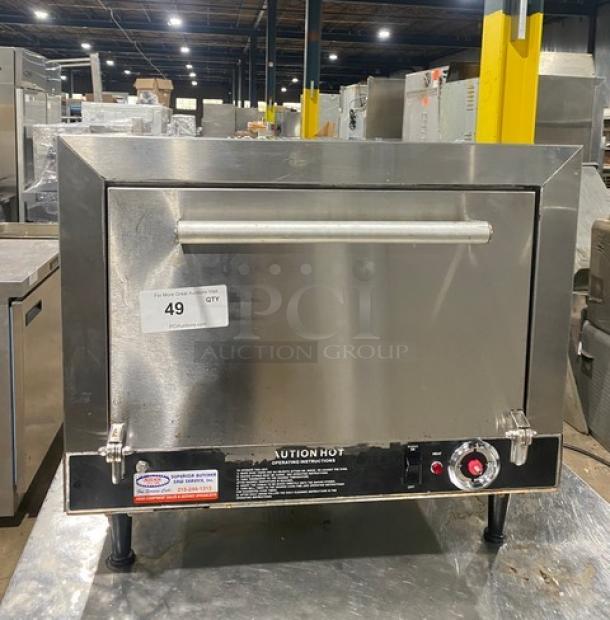 Nemco 6205 stainless steel countertop pizza deck oven, 120V, single compartment, electric powered, on legs, serial L09-009.