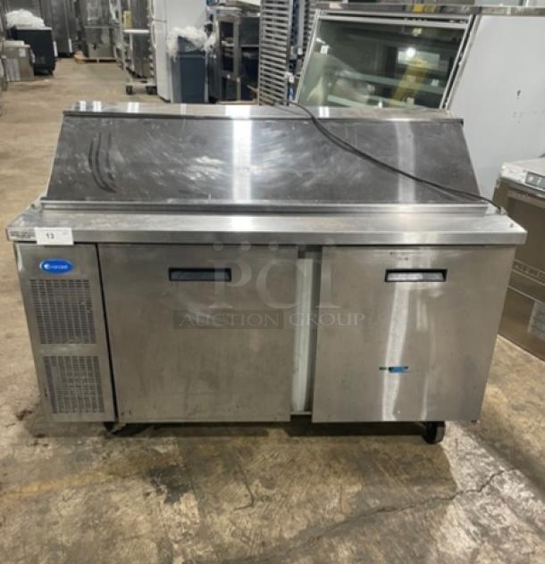 Randell stainless steel 2-door refrigerated prep table, Model 9040K7, with poly coated wire rack, on casters, 115V, 1 Phase.