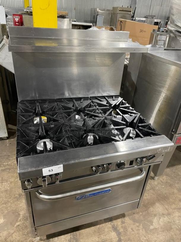Southbend 4364D Commercial Stainless Steel 6-Burner Range/Oven Combo with backsplash, overhead salamander shelf, and wired oven rack.