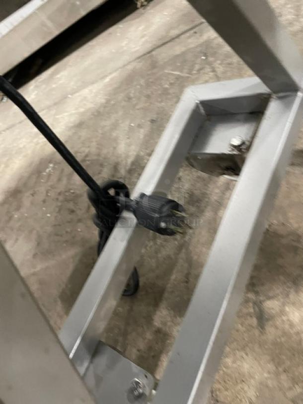 Tre Spade/Omcan MX-50 meat mixing machine on casters, showing its power cord. Model 2020, 220-240V, heavy-duty design.