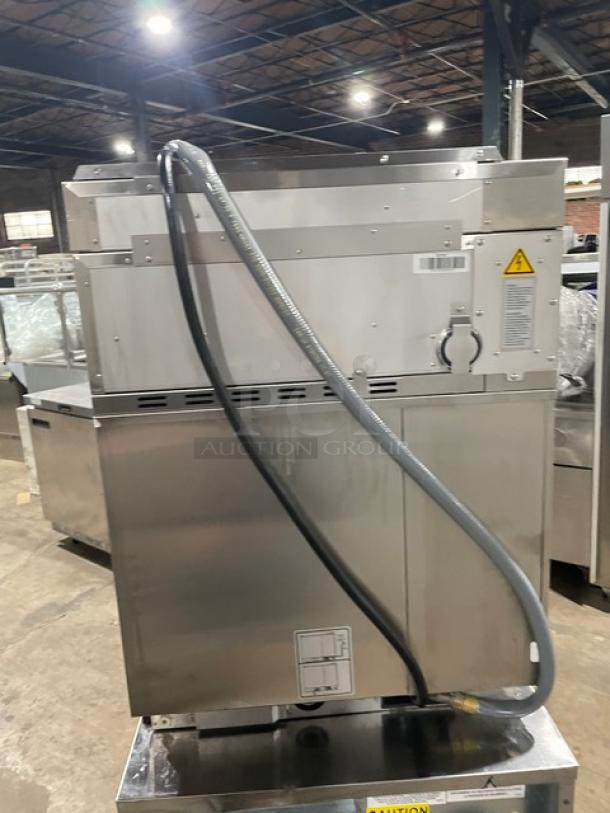 Rational SelfCookingCenter XS Series combi oven, Model SCCXS62/3EUV+, stainless steel, 208V 3 Phase, with exhaust hood.