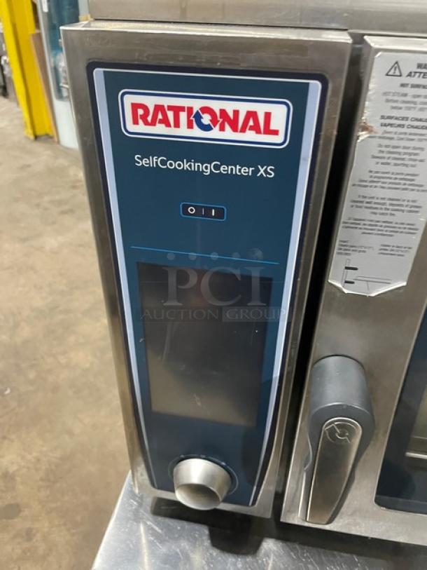 Rational SelfCookingCenter XS Series combi oven, model SCCXS62/3EUV+, stainless steel, electric, 208V 3 phase, with exhaust hood.