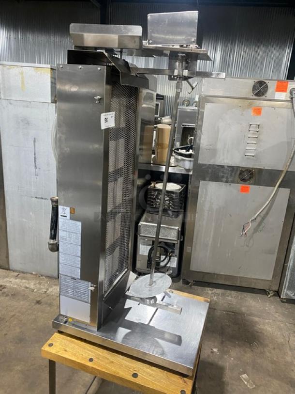 Inoksan PDG105MN 2022 stainless steel vertical broiler gyro machine, 5 double burners, individual controls, on legs, natural gas powered.