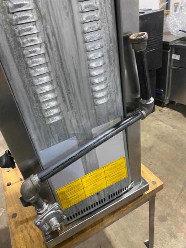 Inoksan 2022 commercial stainless steel doner kebab machine, model PDG105MN, with 5 double burners, natural gas powered.