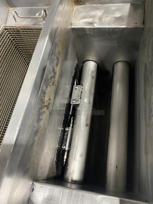 Pitco Solofilter Solstice Supreme deep fat fryer interior, showing stainless steel split-tank design with fry baskets, model SFSSH55TRJS.