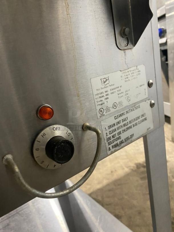 Duke AeroHot E303SWM stainless steel electric food table control panel with dials and cleaning instructions.