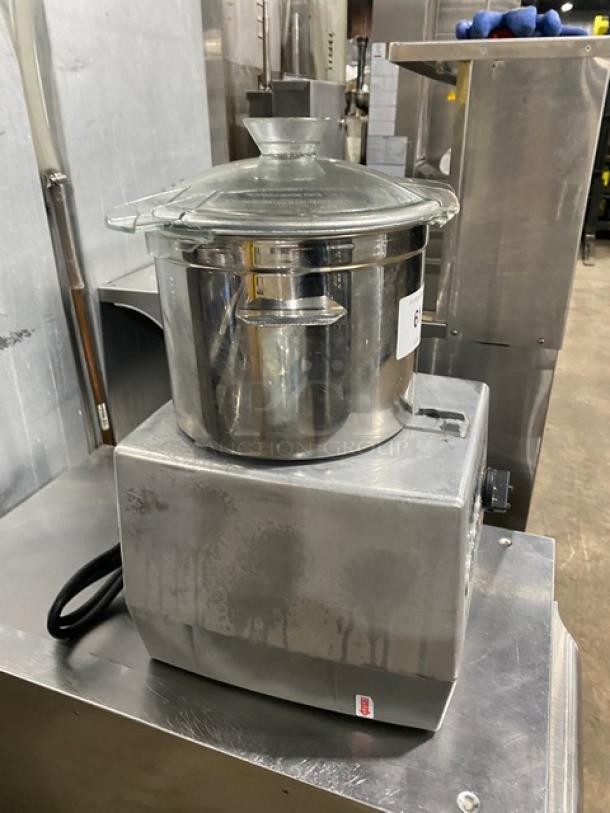 Robot Coupe R602VV commercial food processor, 7 Qt. with stainless steel handled bowl, 120V, on legs, good condition.