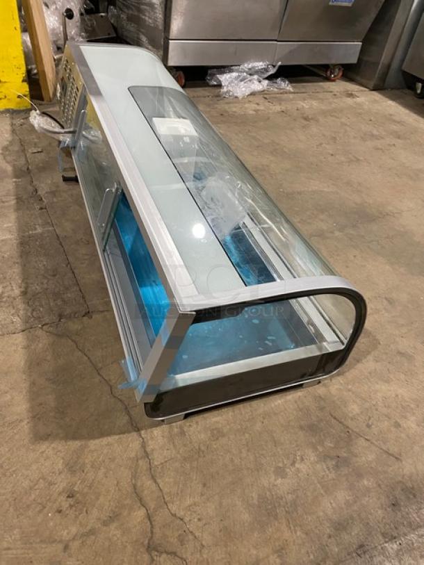 Marchia MSU150S 53" stainless steel sushi display showcase with curved glass, LED lights, and dual sliding glass doors.