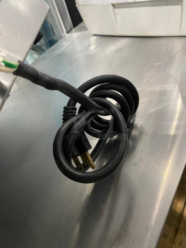 Nemco 6055A43 stainless steel electric countertop food warmer. Single well, 120V. Includes power cord. Good condition.