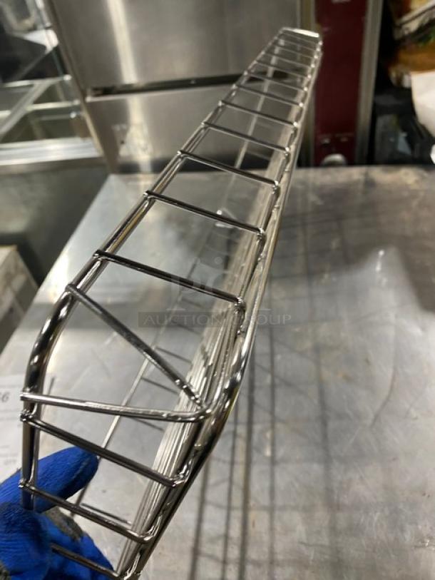 Commercial chrome plated full-sized bagel/pastry wired rack, durable, glossy finish, excellent condition.