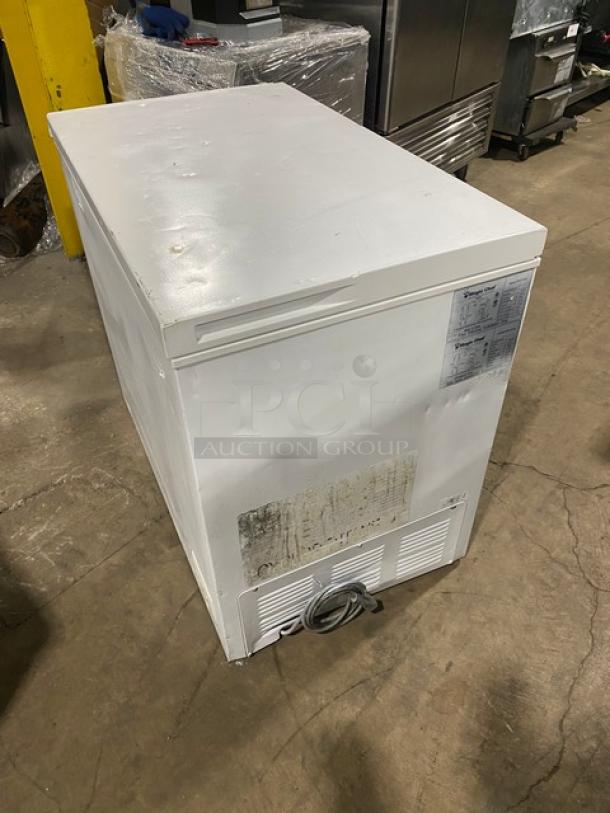 Magic Chef 2021 commercial white chest freezer, model HMCF9W3, manual-defrost, 115V, noticeable wear, visible labels.