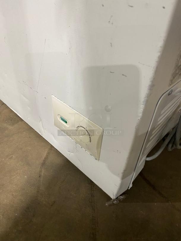 Magic Chef 2021 white chest freezer, model HMCF9W3, manual defrost, 115V, visible control dial, minor exterior wear.